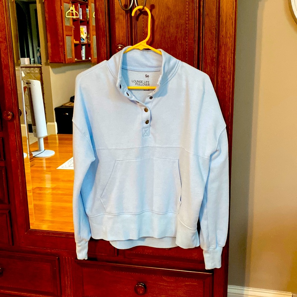 Light blue sweat shirt with kangaroo pocket